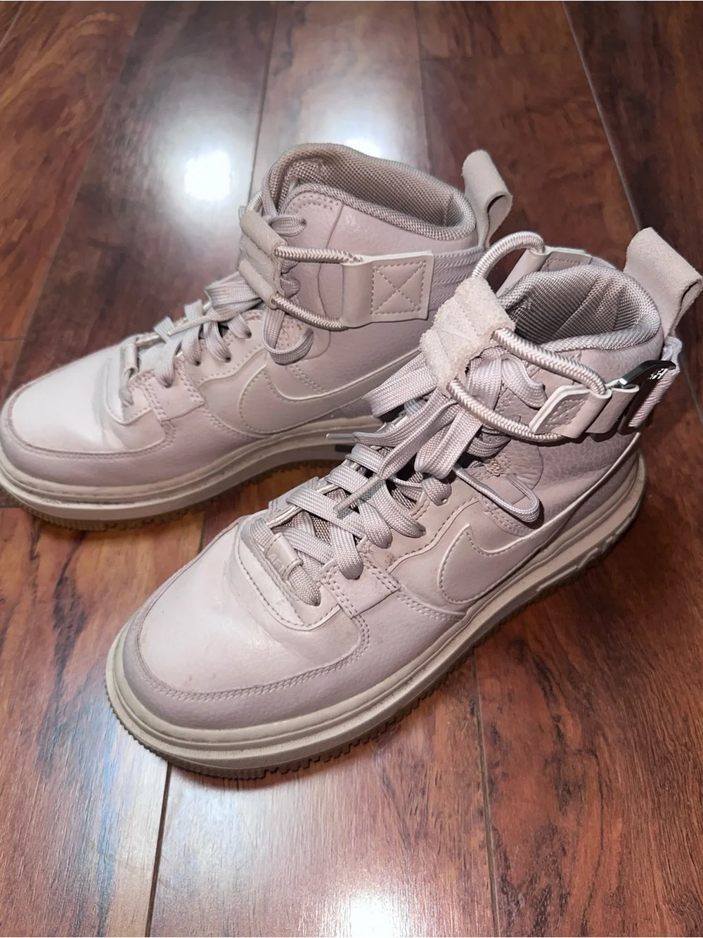 Nike High-Top Sneakers in Pale Pink